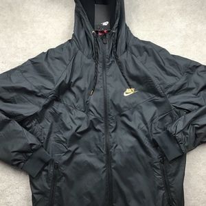 nike winterized windrunner black and gold